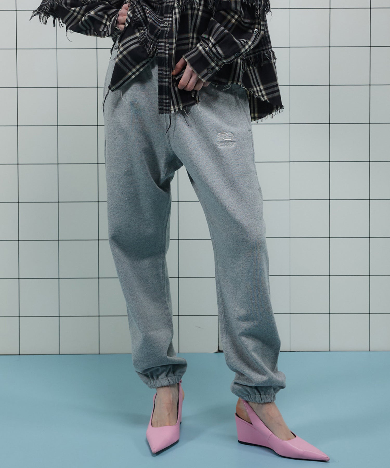 Connecting Embroidery Sweat Pants