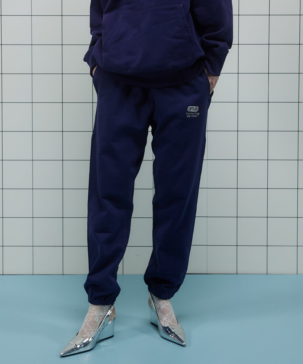 Connecting Embroidery Sweat Pants