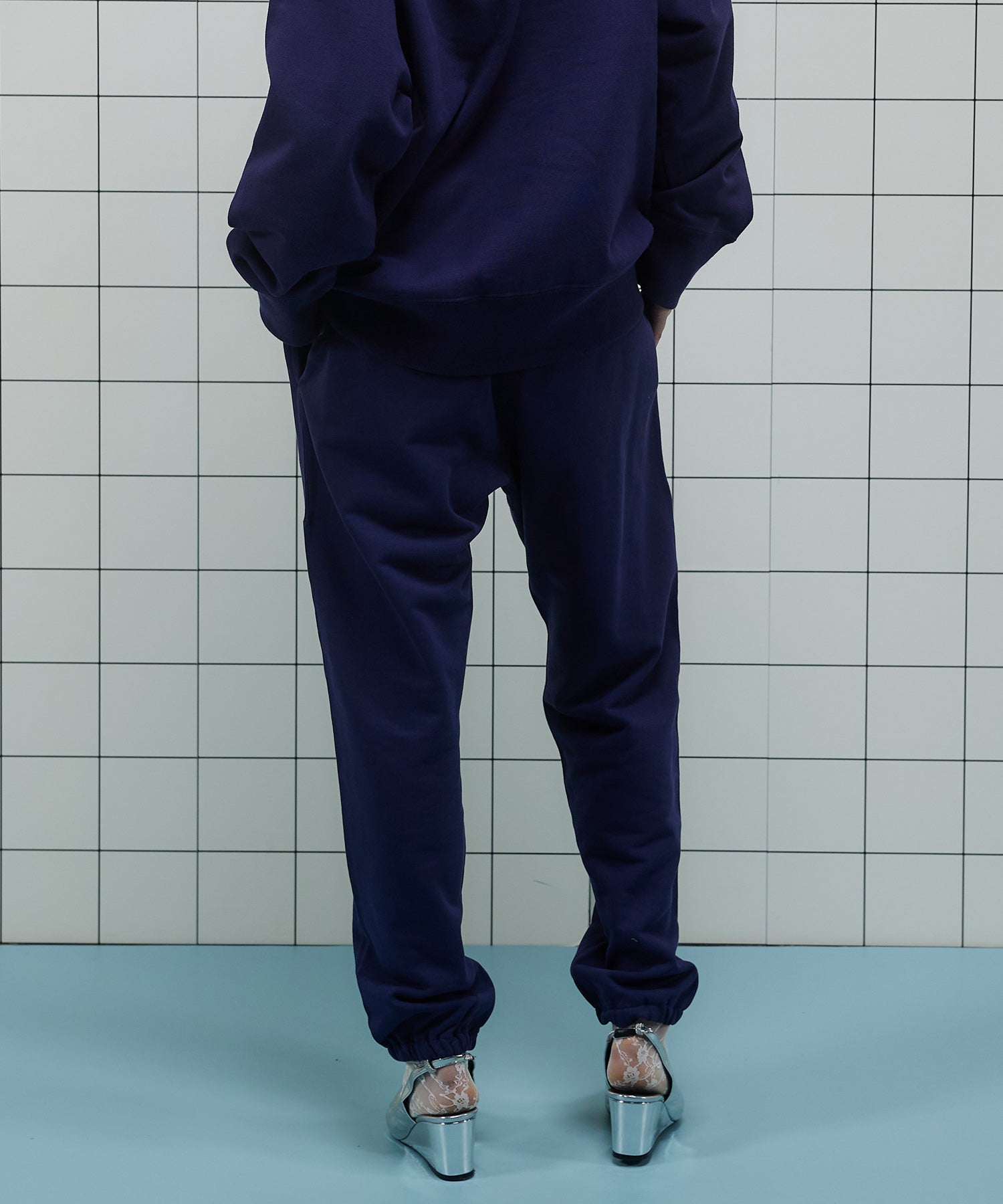 Connecting Embroidery Sweat Pants